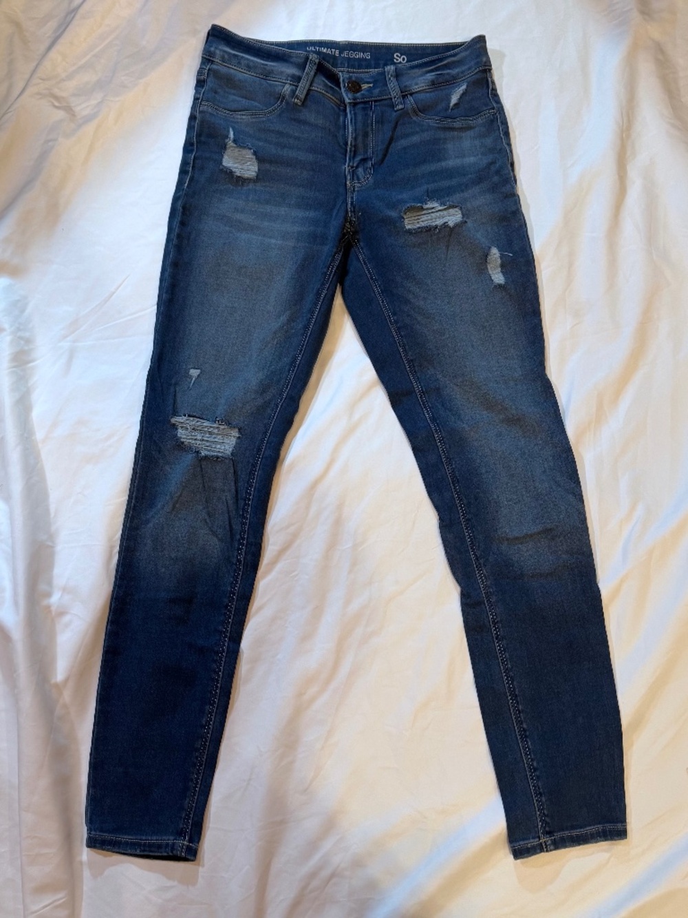 SO Ultimate Jegging stretchy dark wash distressed skinny jean size 7